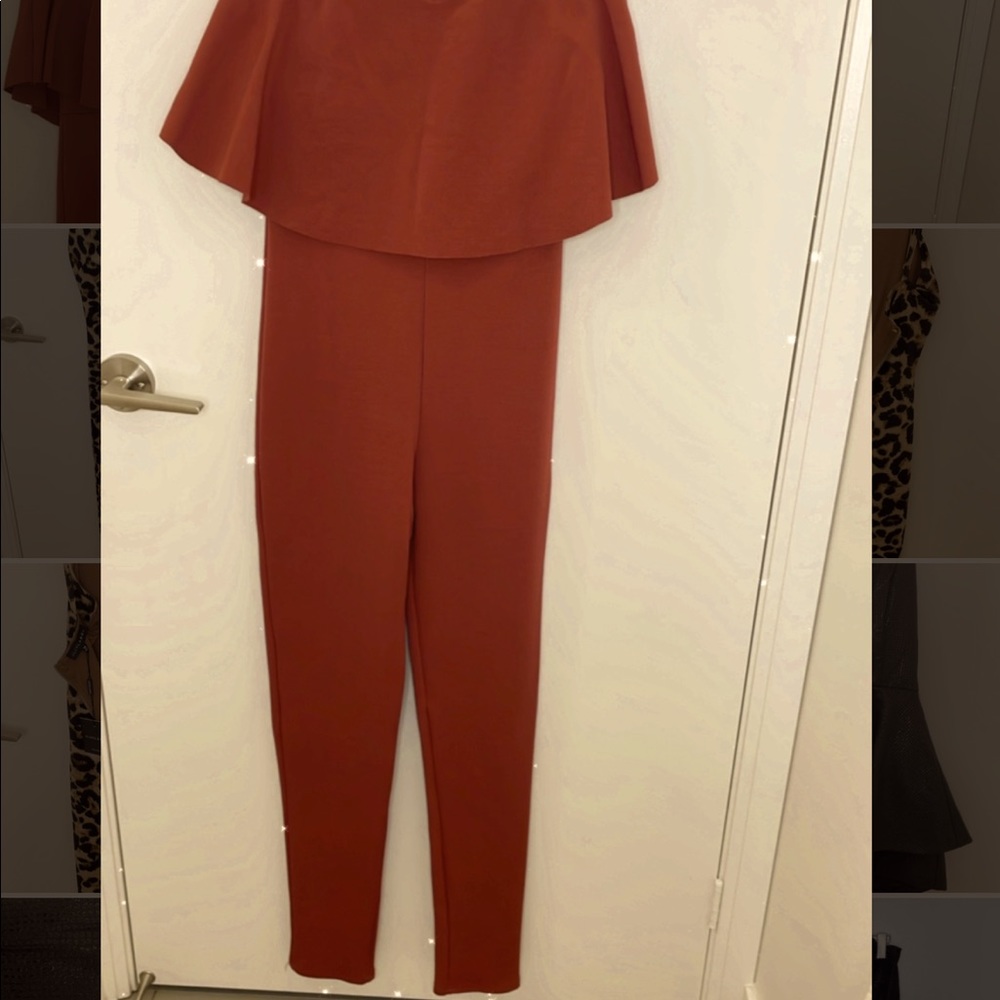 A dusty rose with a hint of brown. One piece, strapless, extremely comfortable.